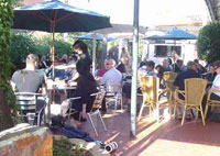 People dining at the Sussex Hotel, Adelaide, Australia